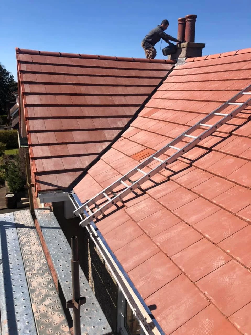 Red Roof Tiles And Ridge Details
